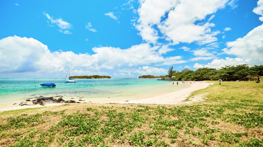 Family, kids in the sea, Mauritius